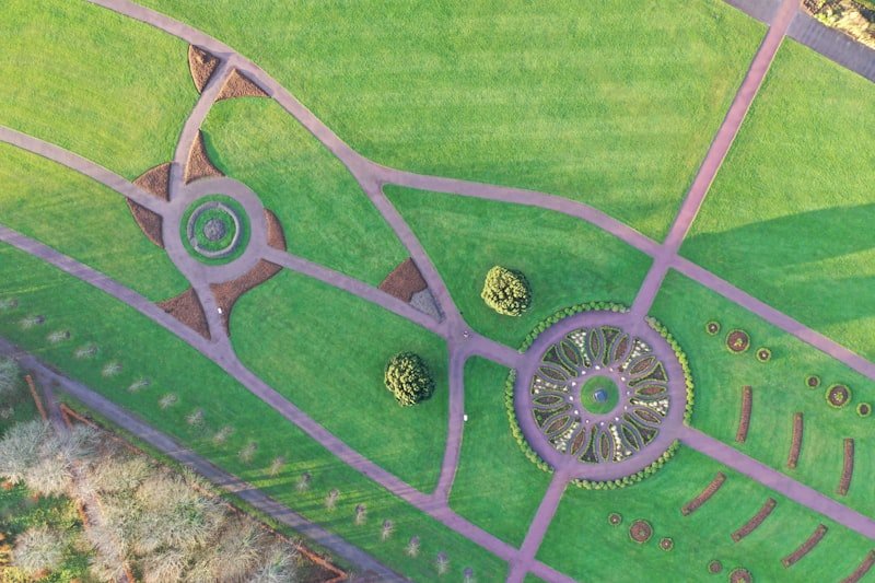 green and white floral textile